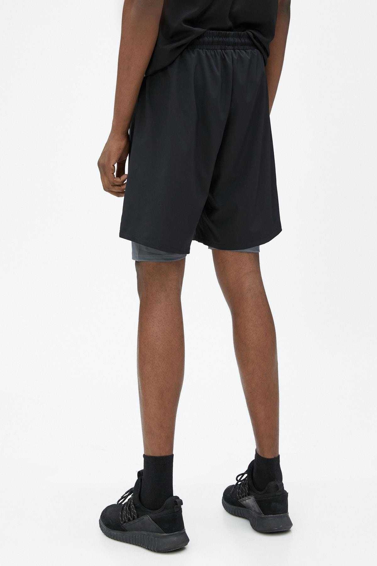 شلوارک اسپرت ساق دار دولایه با بند کمر