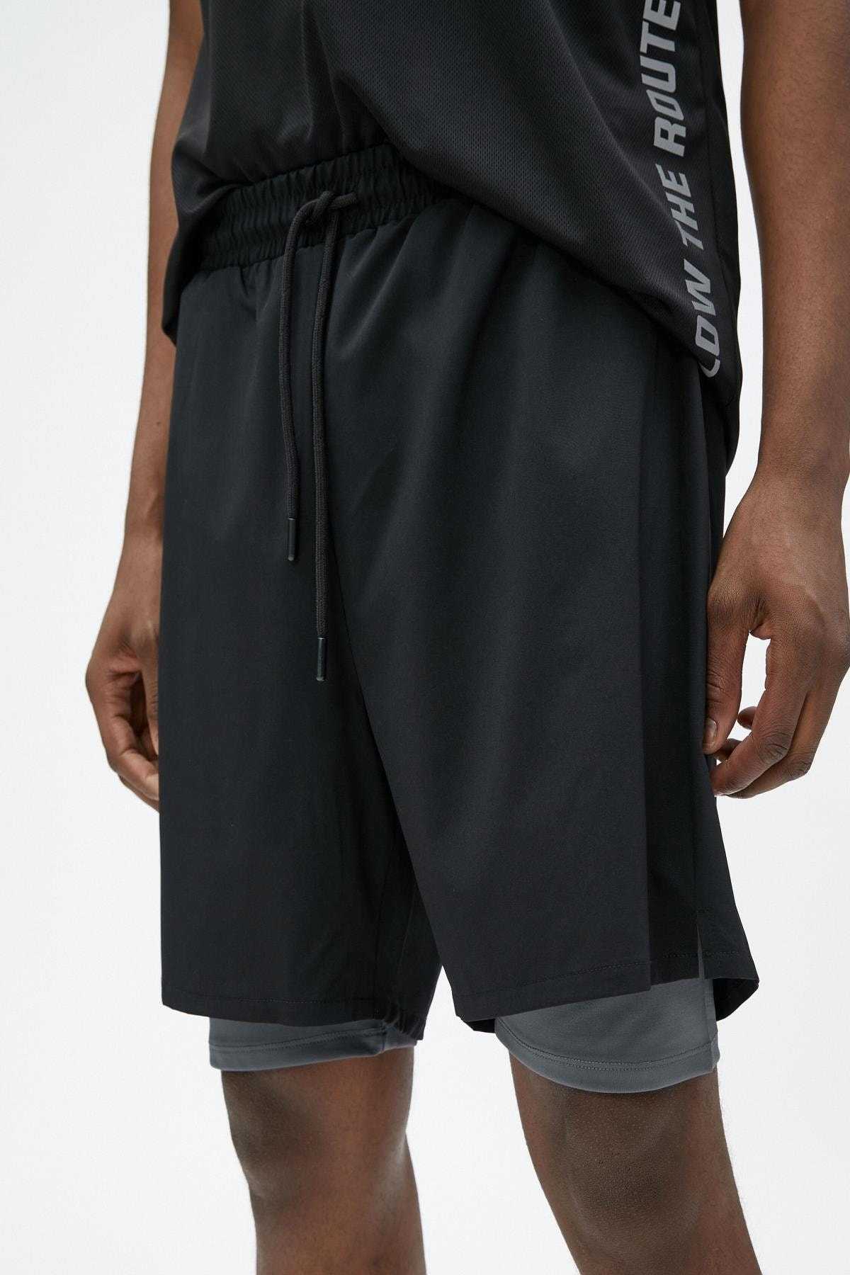 شلوارک اسپرت ساق دار دولایه با بند کمر