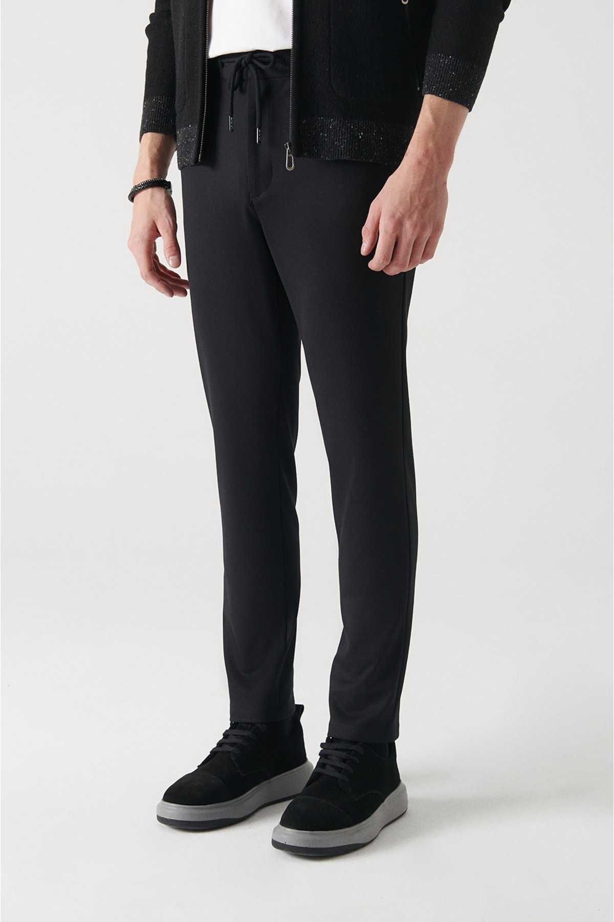 شلوار مردانه مشکی کشدار کمربند با تناسب ریلکس و مناسب گاه به گاه