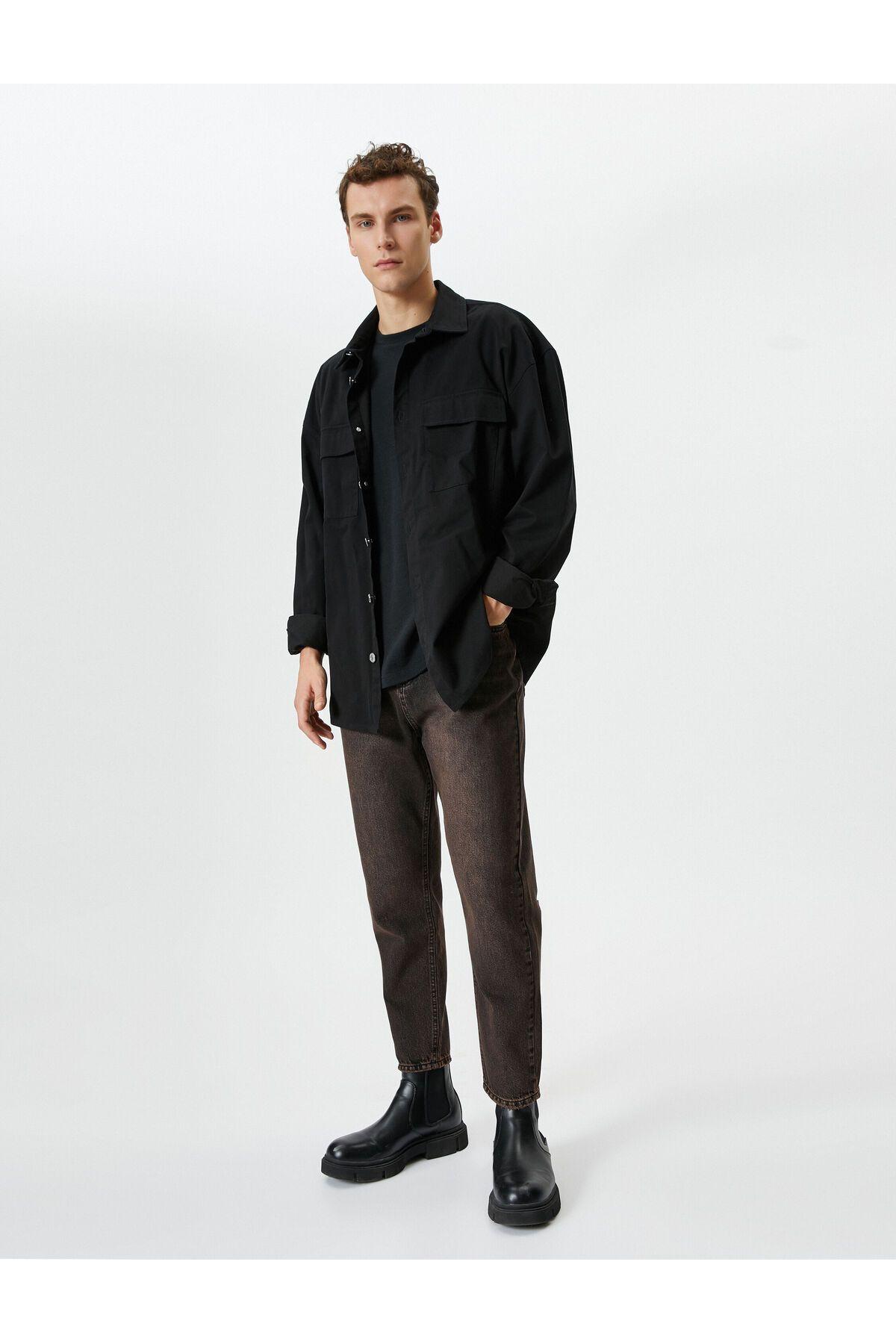 شلوار جین شسته شده با دکمههای جیبی با جزئیات مناسب Relax Fit