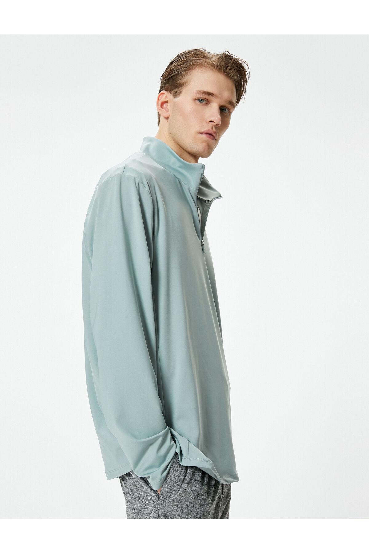 سویشرت اسپرت یقه بلند نیم زیپ