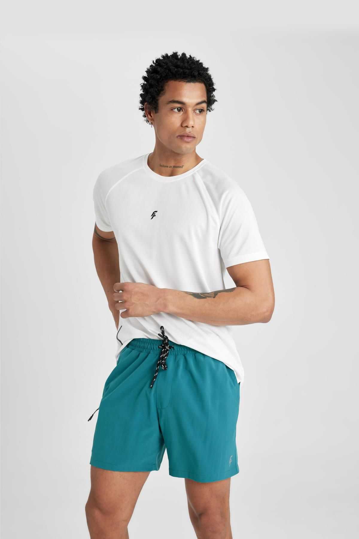 شورت شنای کوتاه بافت انعطاف پذیر چاپ شده DeFactoFit