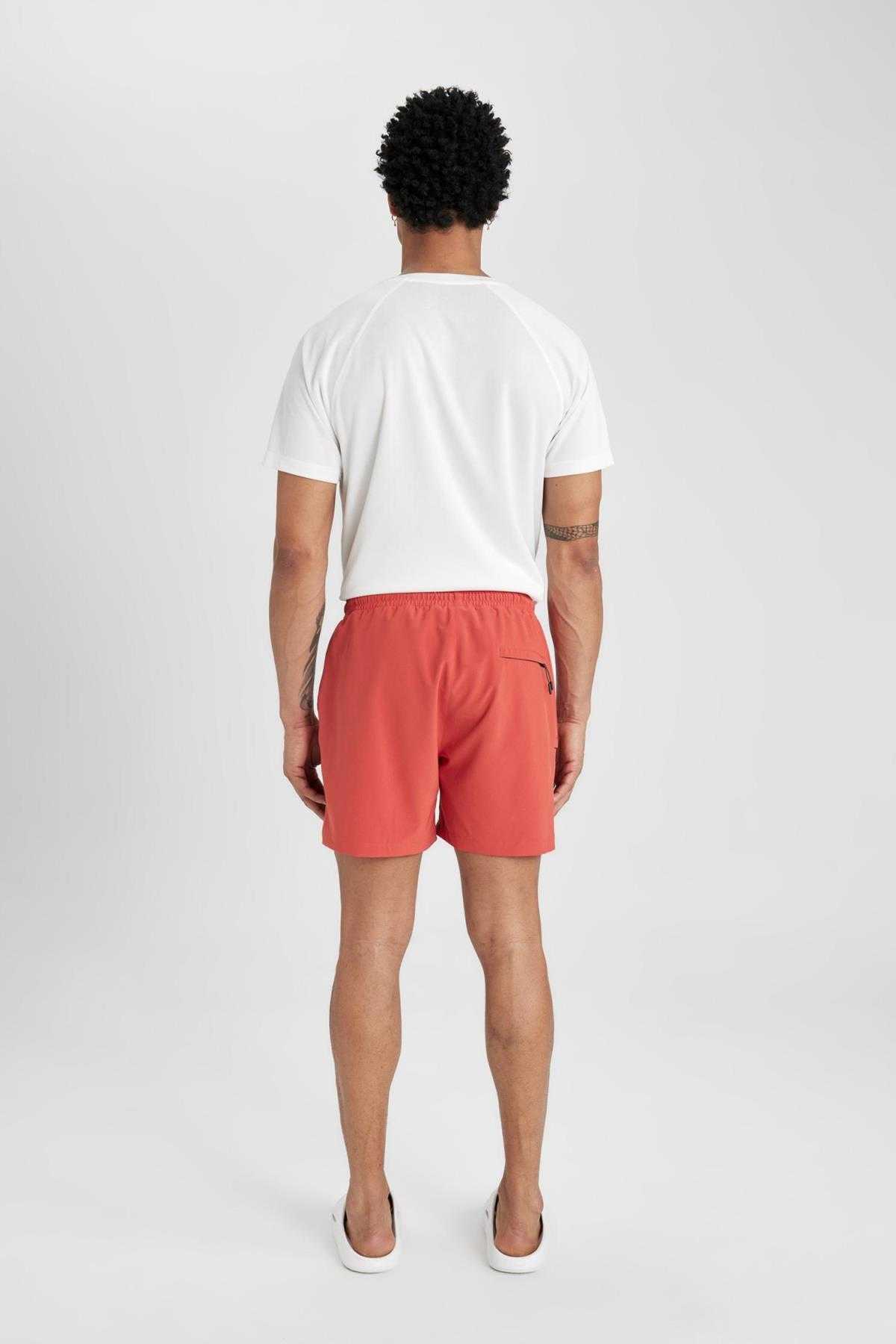 شورت شنای کوتاه بافت انعطاف پذیر چاپ شده DeFactoFit