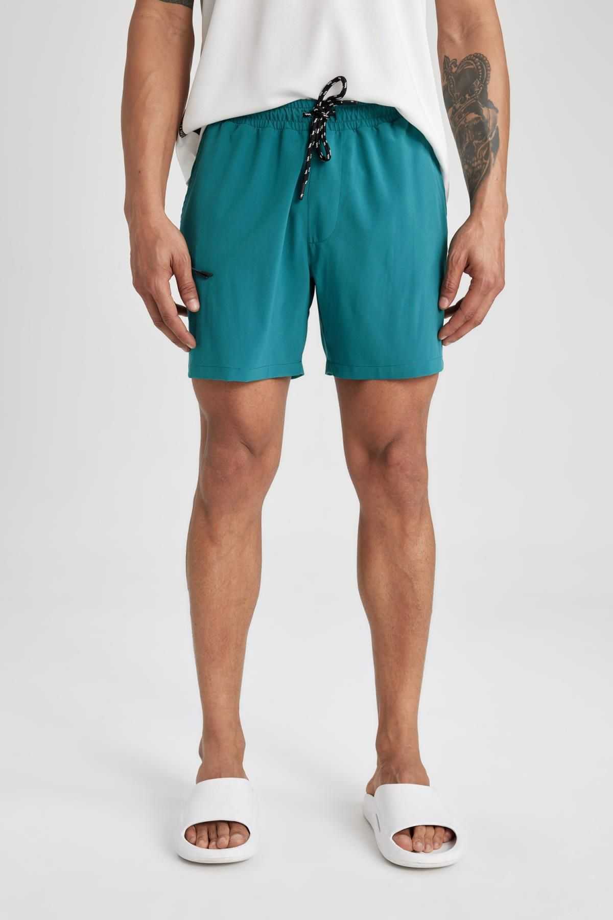 شورت شنای کوتاه بافت انعطاف پذیر چاپ شده DeFactoFit