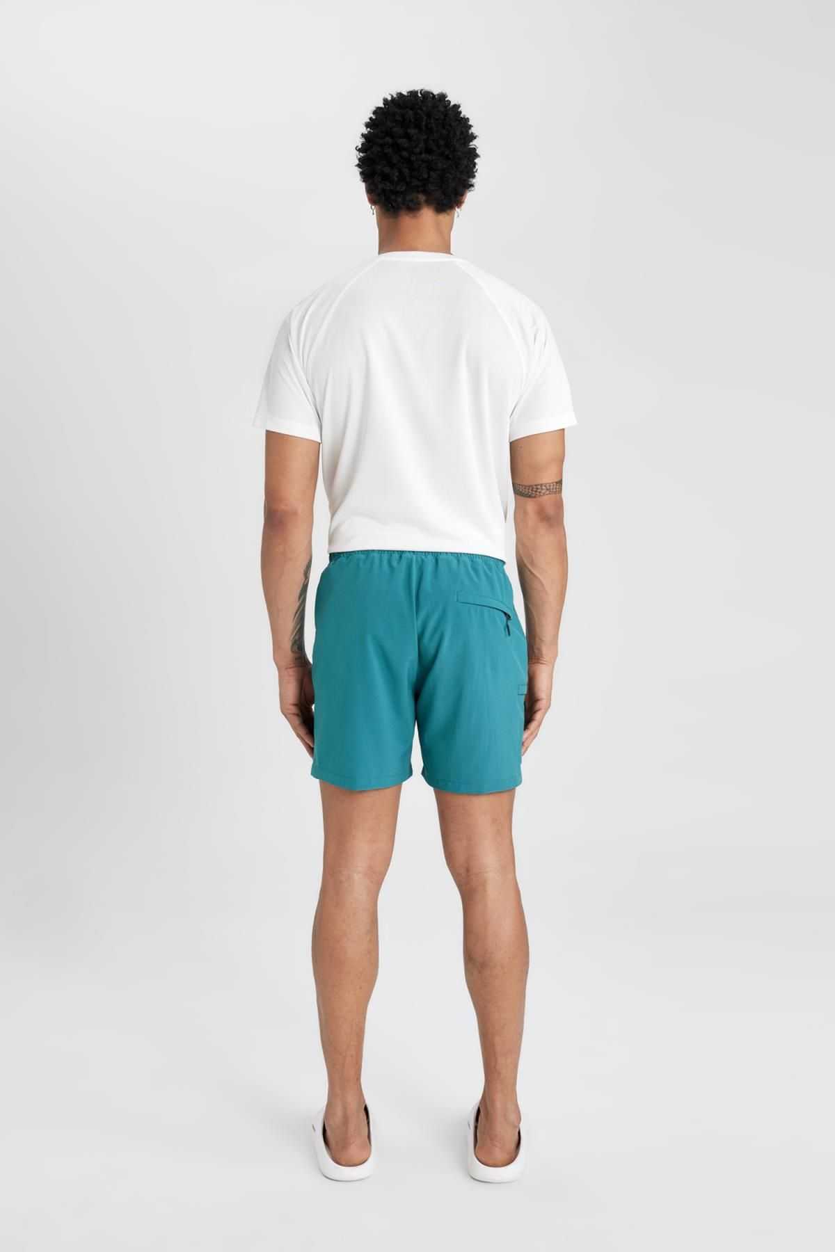 شورت شنای کوتاه بافت انعطاف پذیر چاپ شده DeFactoFit