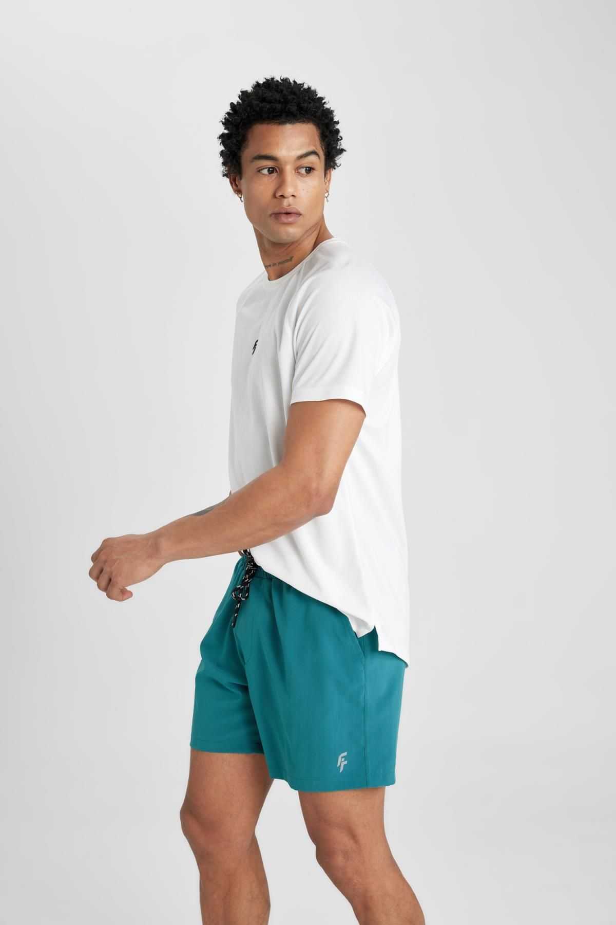 شورت شنای کوتاه بافت انعطاف پذیر چاپ شده DeFactoFit