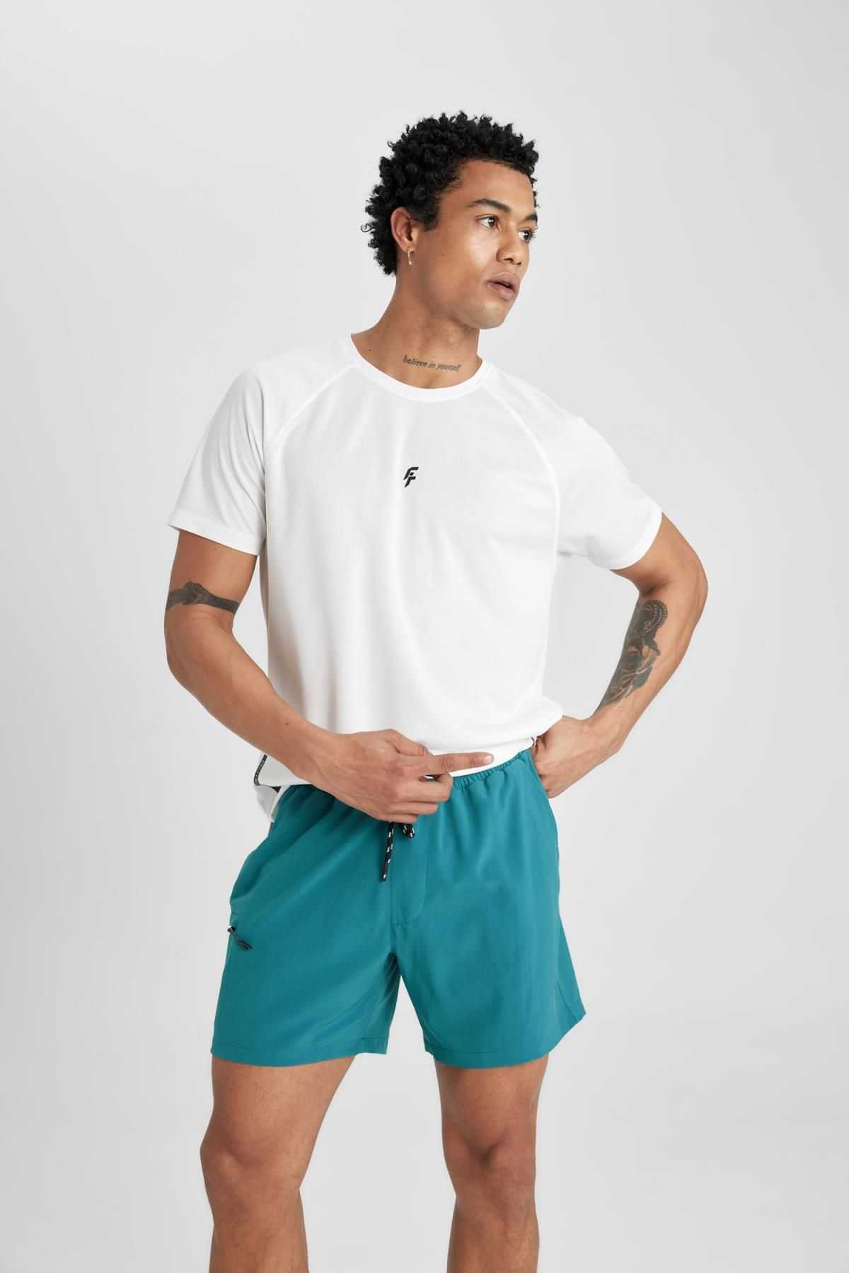 شورت شنای کوتاه بافت انعطاف پذیر چاپ شده DeFactoFit