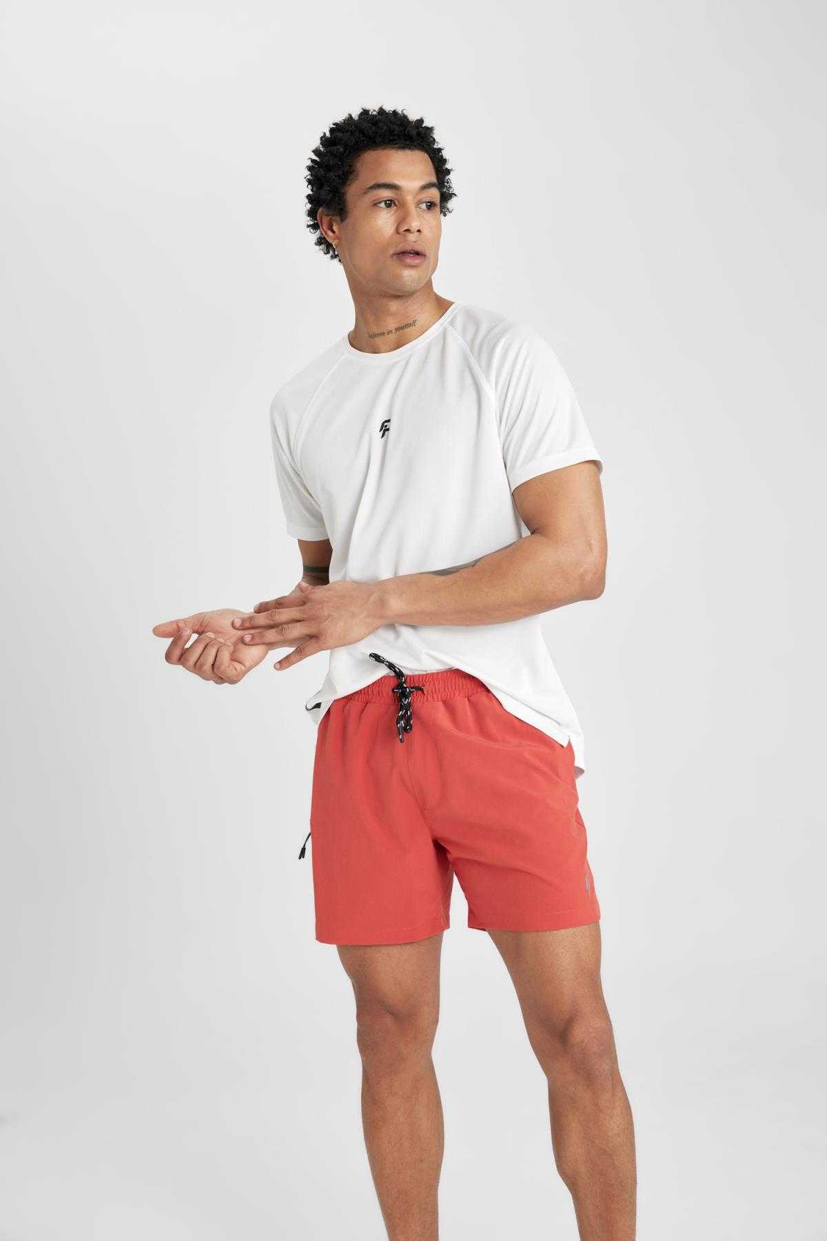 شورت شنای کوتاه بافت انعطاف پذیر چاپ شده DeFactoFit