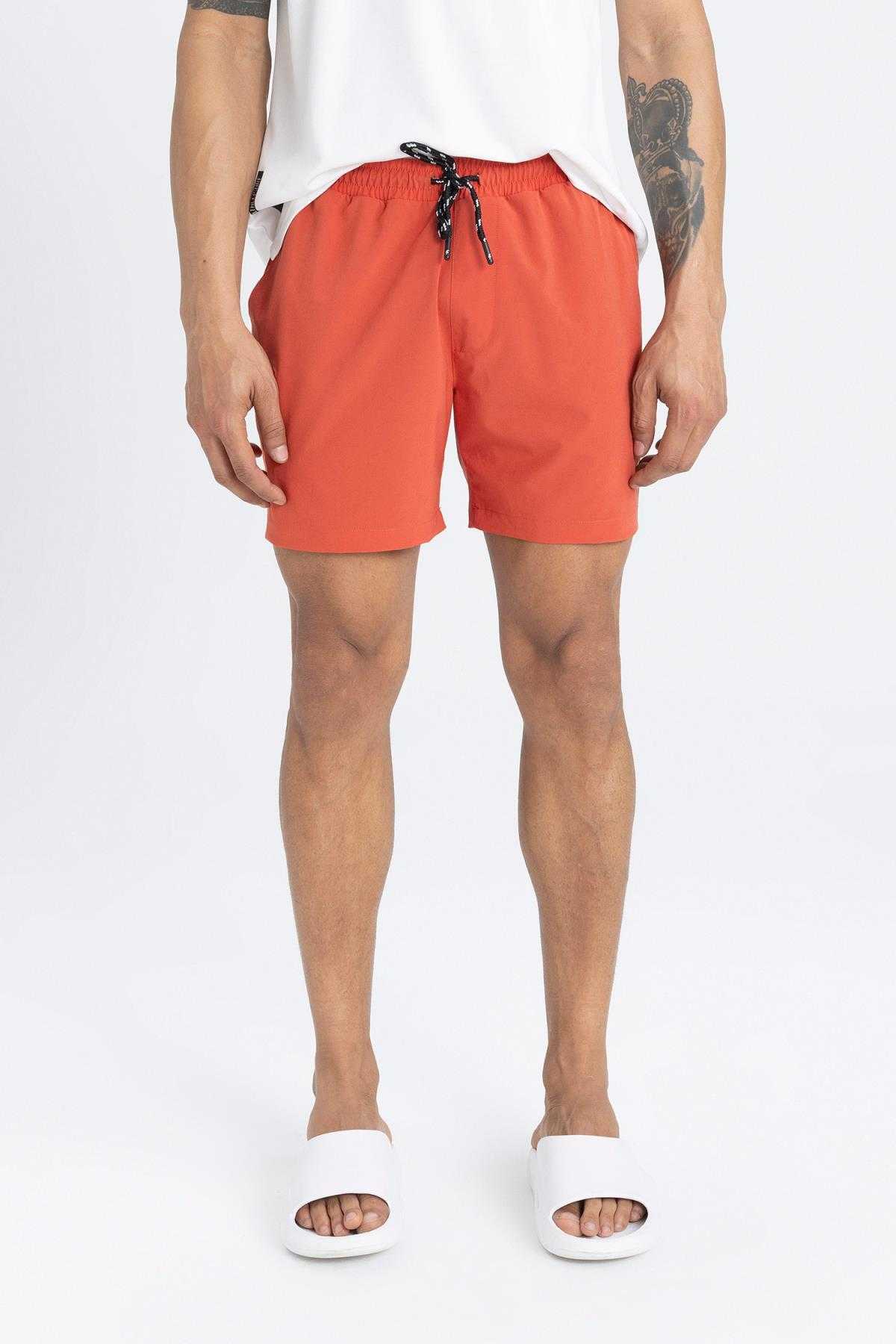 شورت شنای کوتاه بافت انعطاف پذیر چاپ شده DeFactoFit