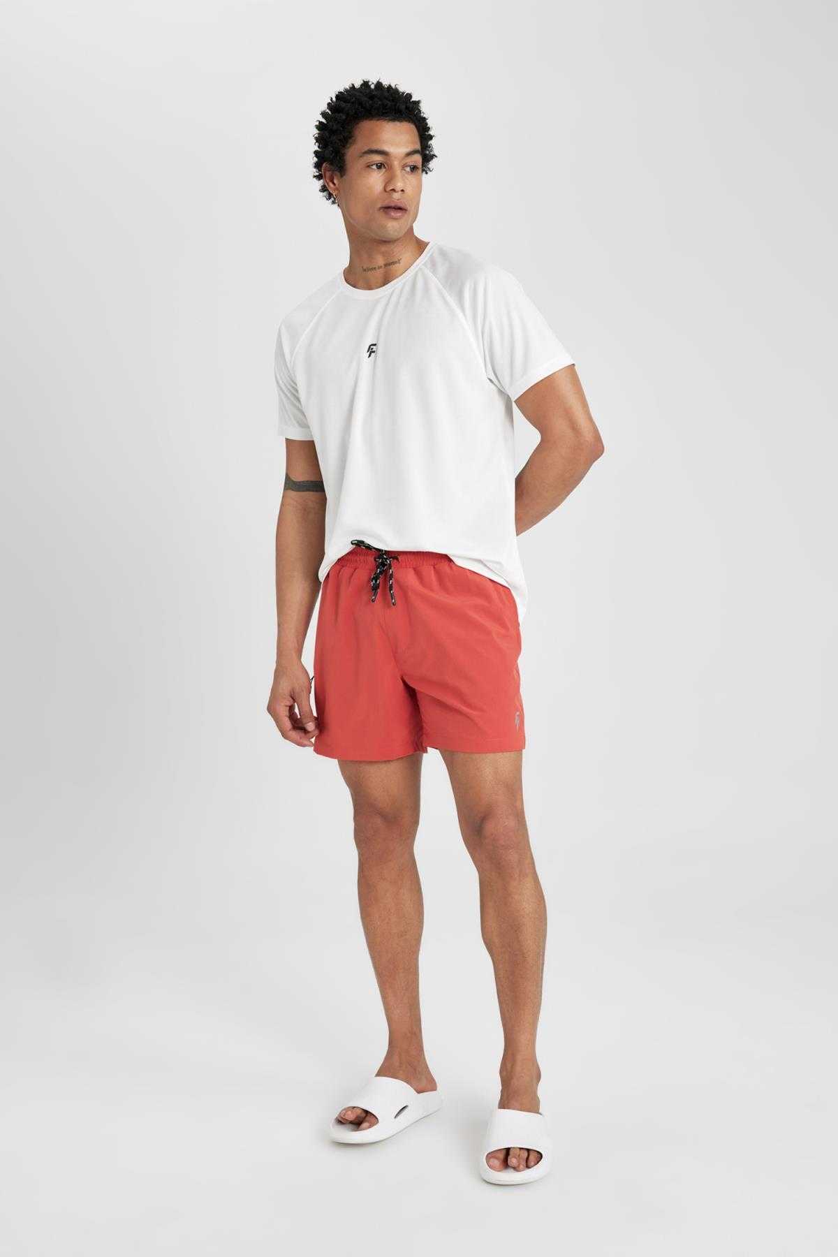 شورت شنای کوتاه بافت انعطاف پذیر چاپ شده DeFactoFit