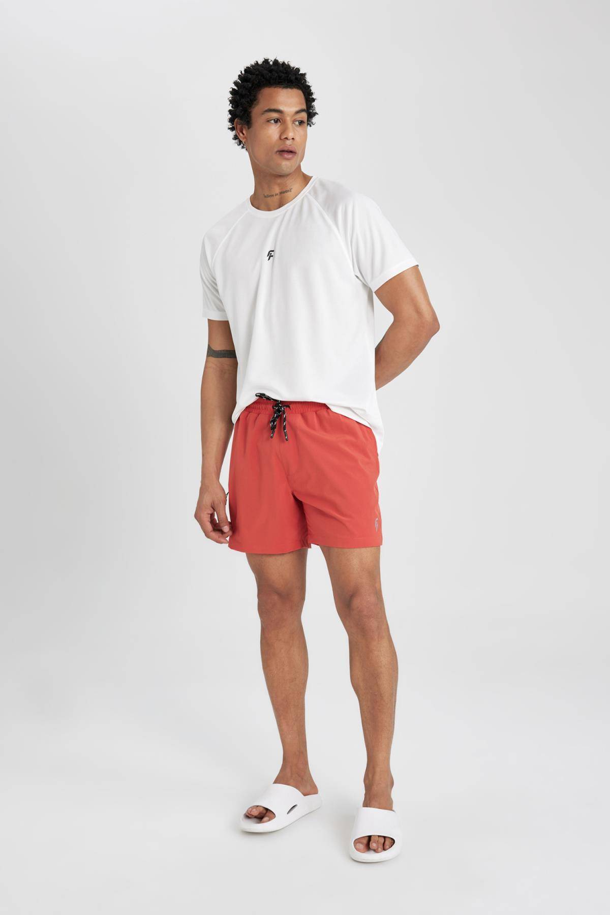 شورت شنای کوتاه بافت انعطاف پذیر چاپ شده DeFactoFit