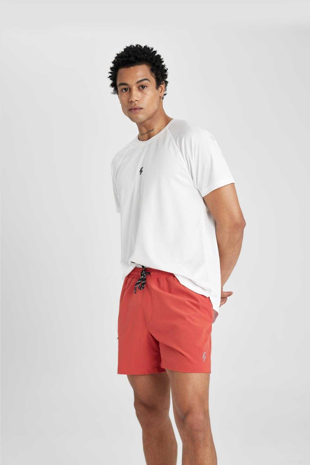 شورت شنای کوتاه بافت انعطاف پذیر چاپ شده DeFactoFit