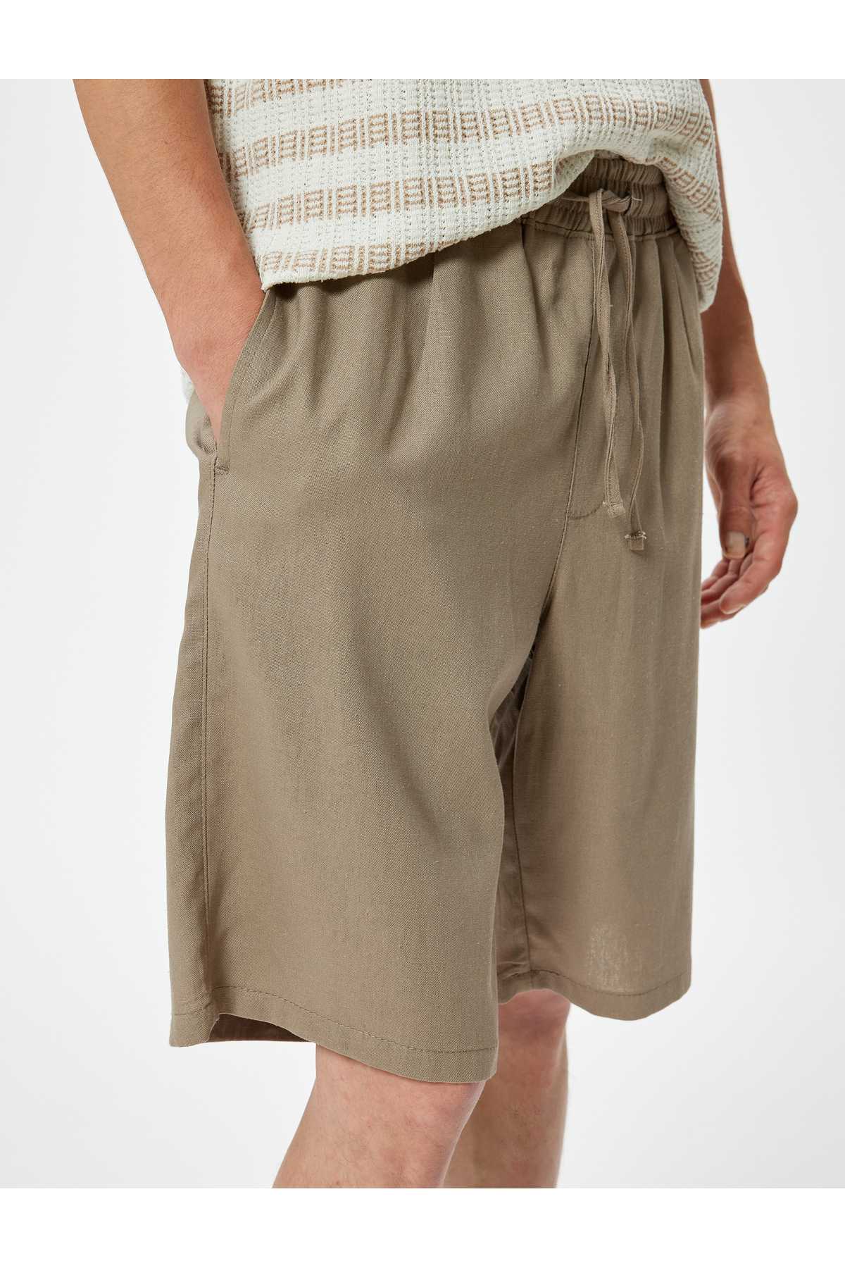 شلوارک سایز بزرگ کتانی برمودا کمربند تا جیب با جزئیات