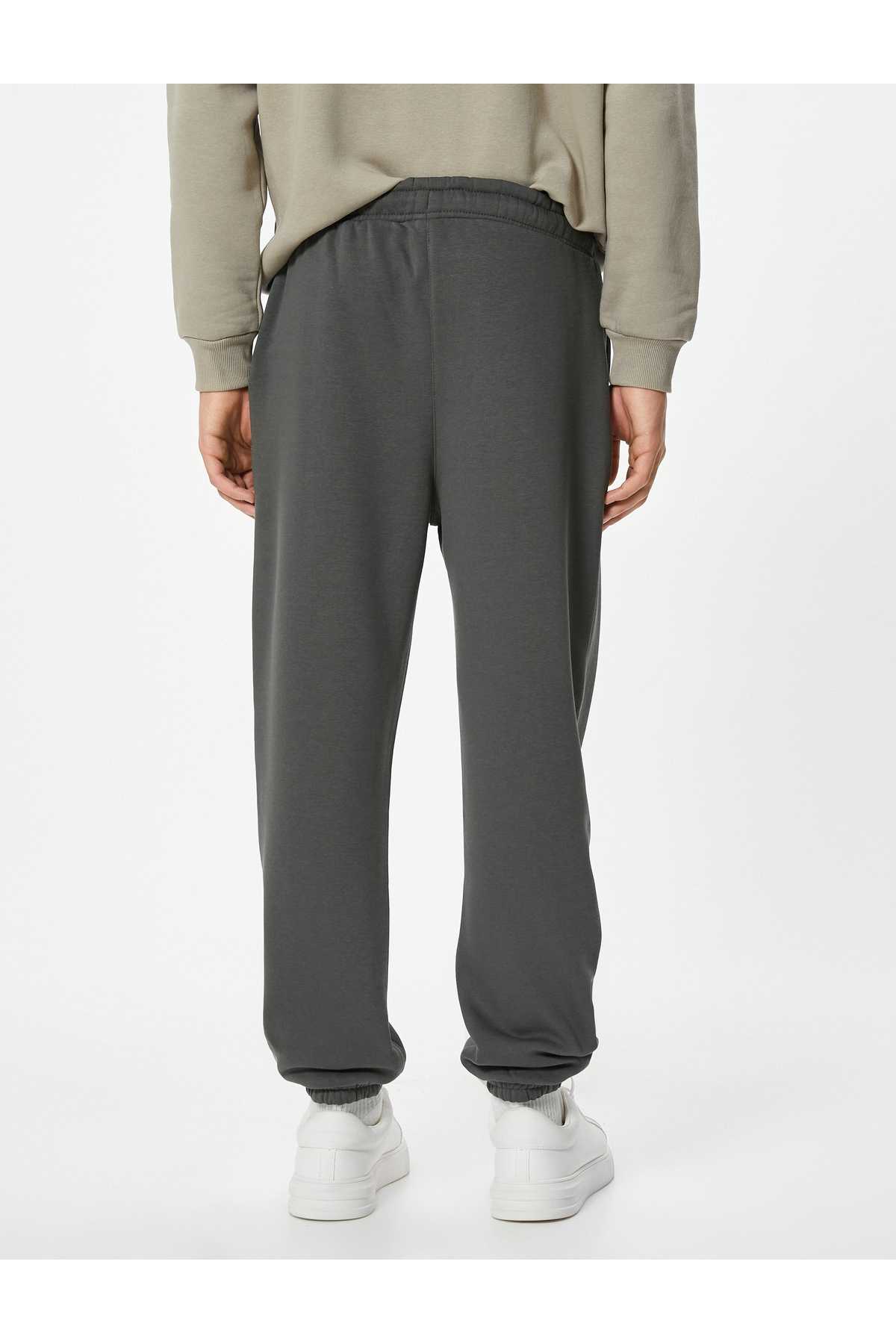 شلوار ورزشی Jogger با دور کمر توری و جزئیات جیب