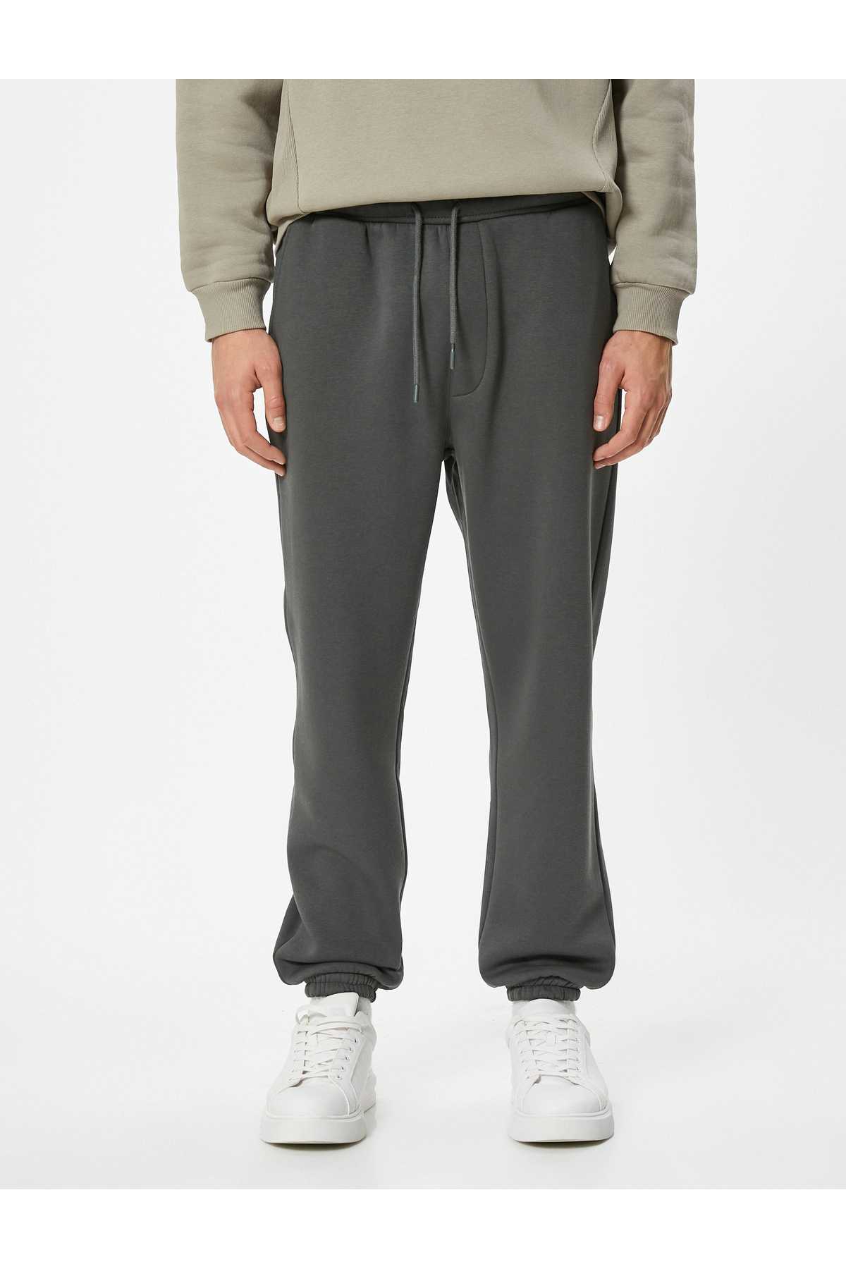 شلوار ورزشی Jogger با دور کمر توری و جزئیات جیب