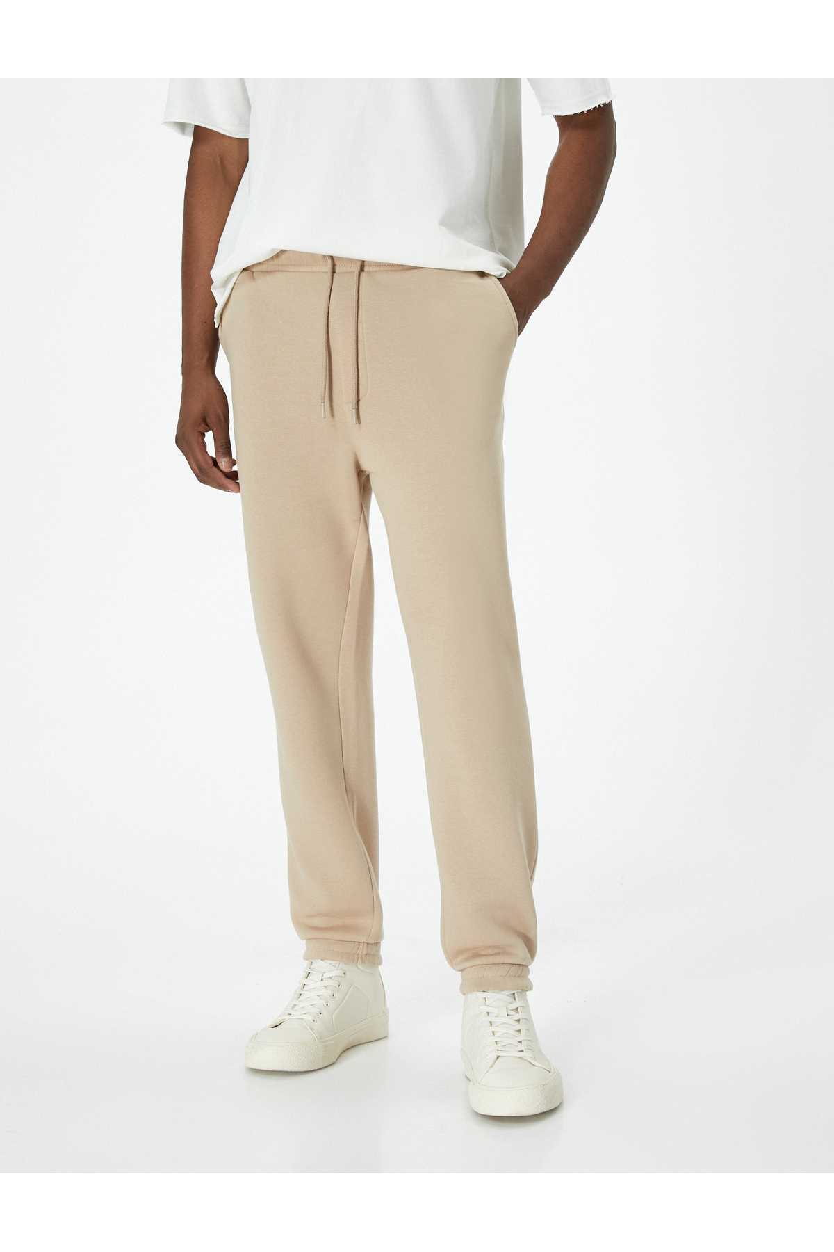 شلوار ورزشی Jogger با دور کمر توری و جزئیات جیب