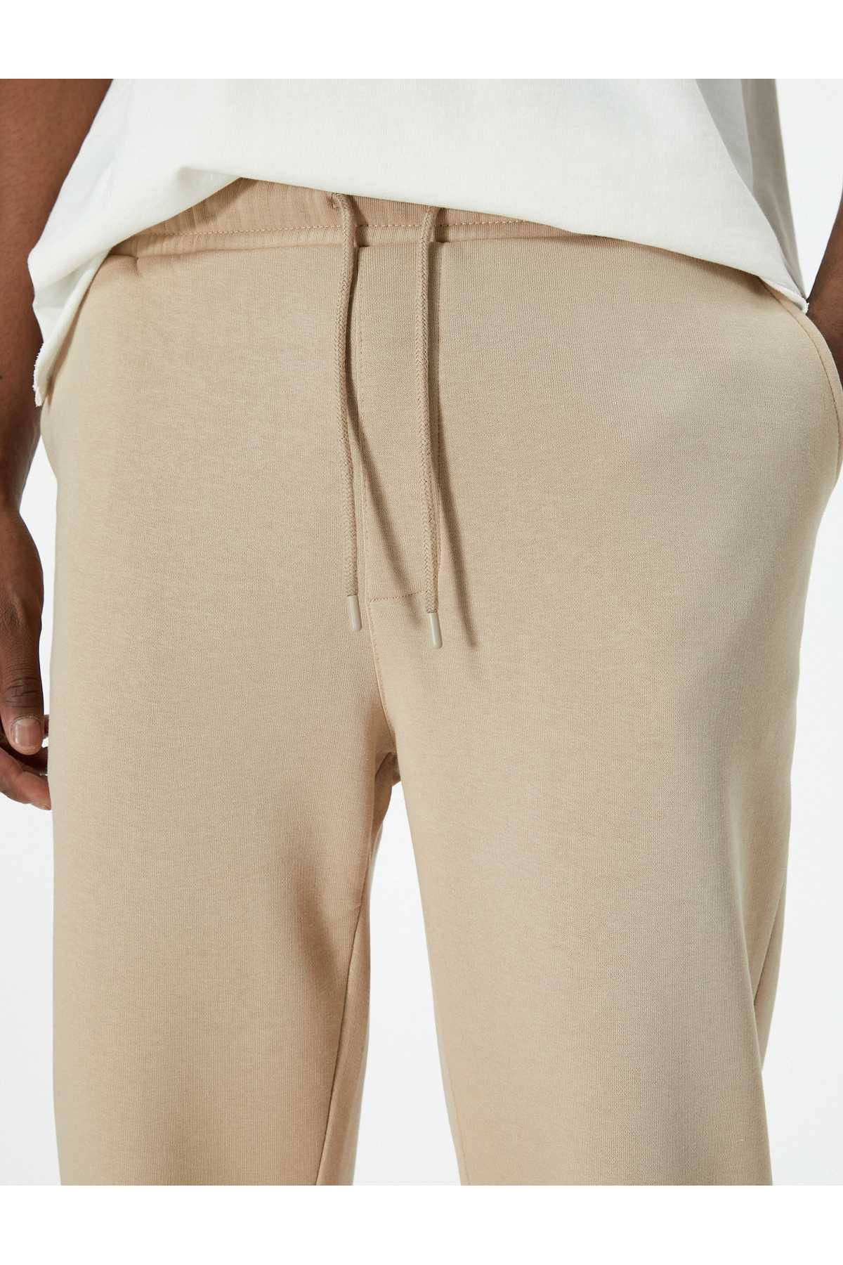 شلوار ورزشی Jogger با دور کمر توری و جزئیات جیب