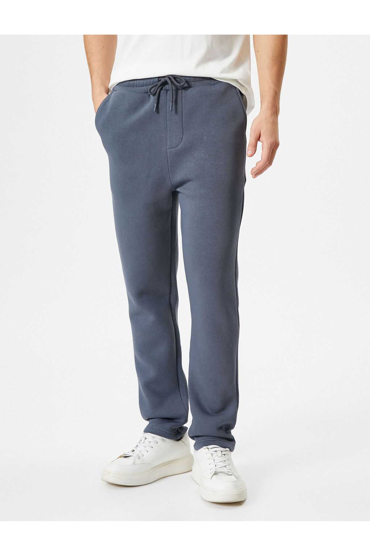 شلوار ورزشی پایه با جزئیات جیب و کمر بسته