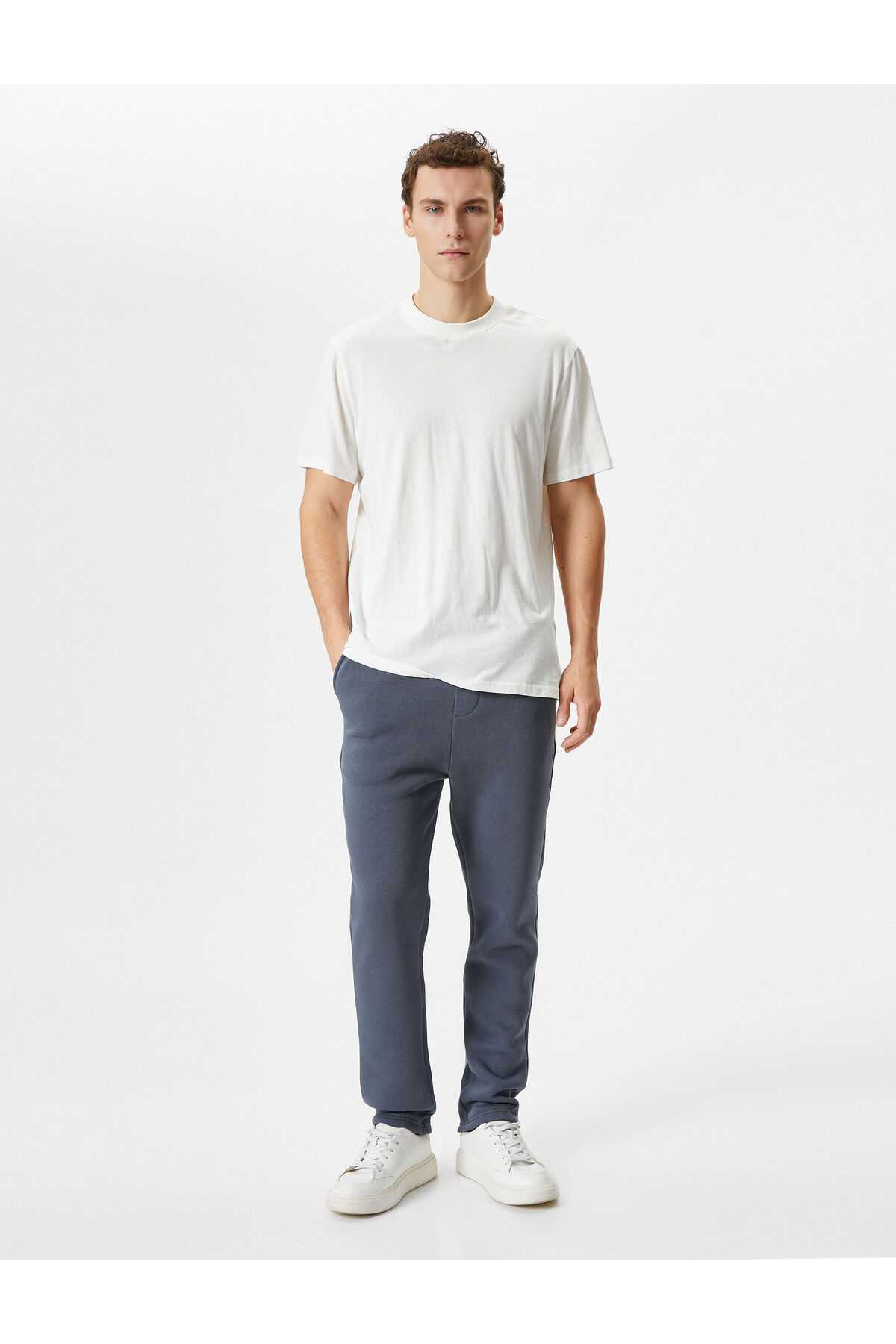 شلوار ورزشی پایه با جزئیات جیب و کمر بسته