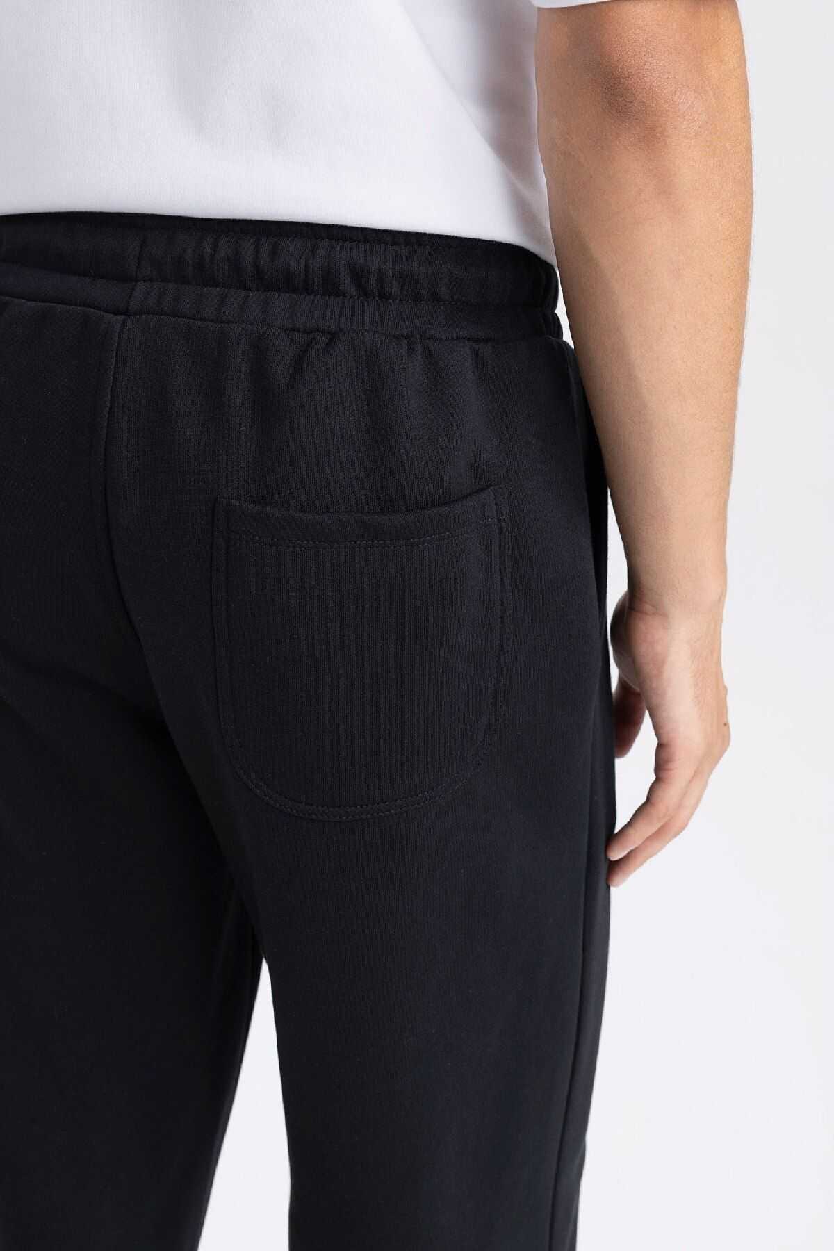 شلوار ورزشی ریلکس فیت سه جیبی ضخیم D8095ax24au