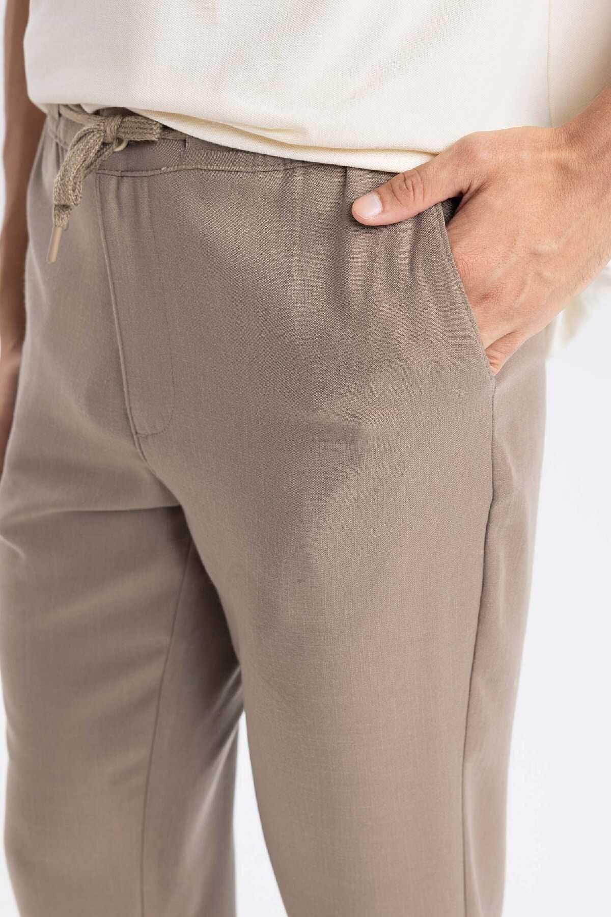 شلوار جیبی توری کمری باریک مردانه خاکی جوگر D8638ax24au