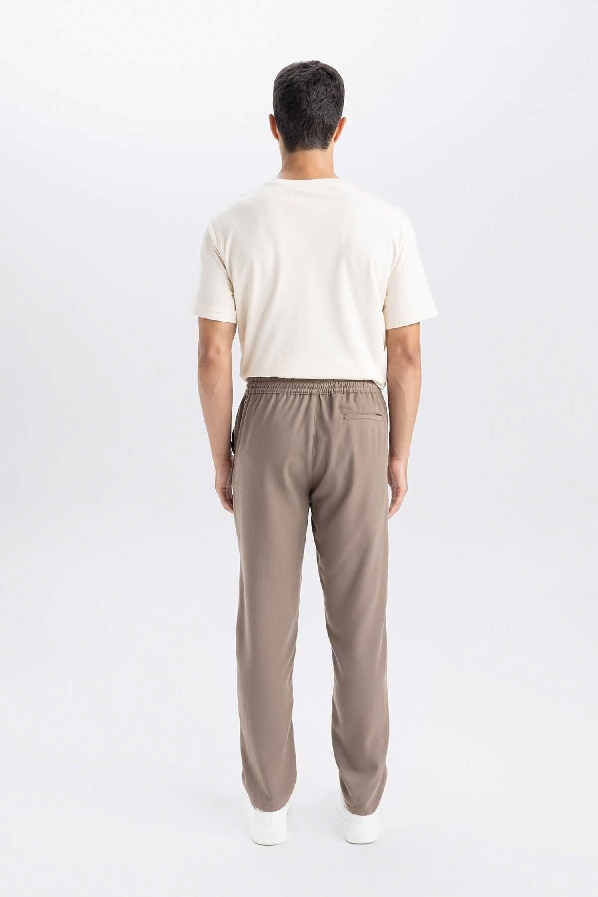 شلوار جیبی توری کمری باریک مردانه خاکی جوگر D8638ax24au