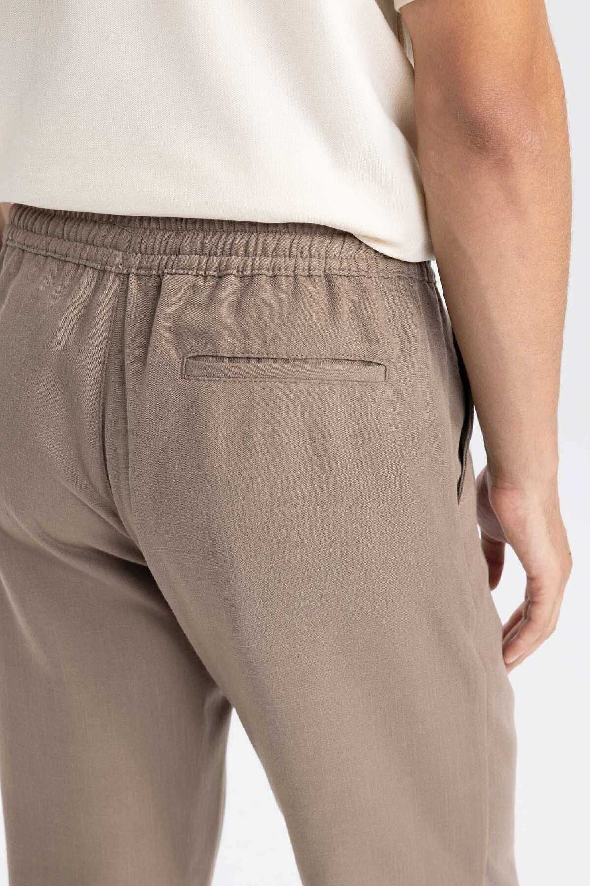 شلوار جیبی توری کمری باریک مردانه خاکی جوگر D8638ax24au