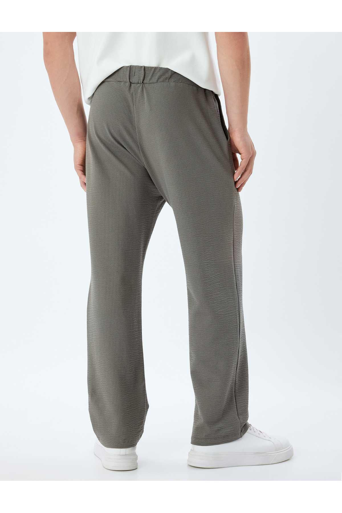 شلوار ورزشی نخی با جزئیات جیب دور کمر توری