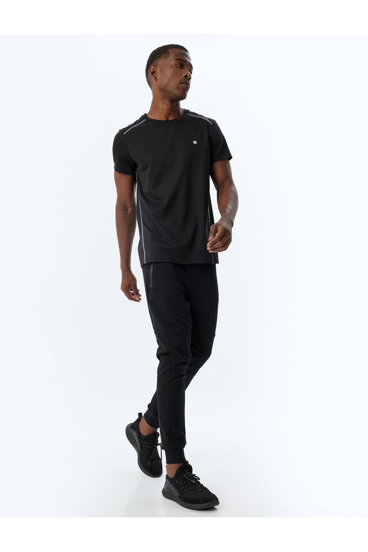 شلوار ورزشی اسپرت دوخت توری دور کمر ترکیبی پنبه ای با جزئیات