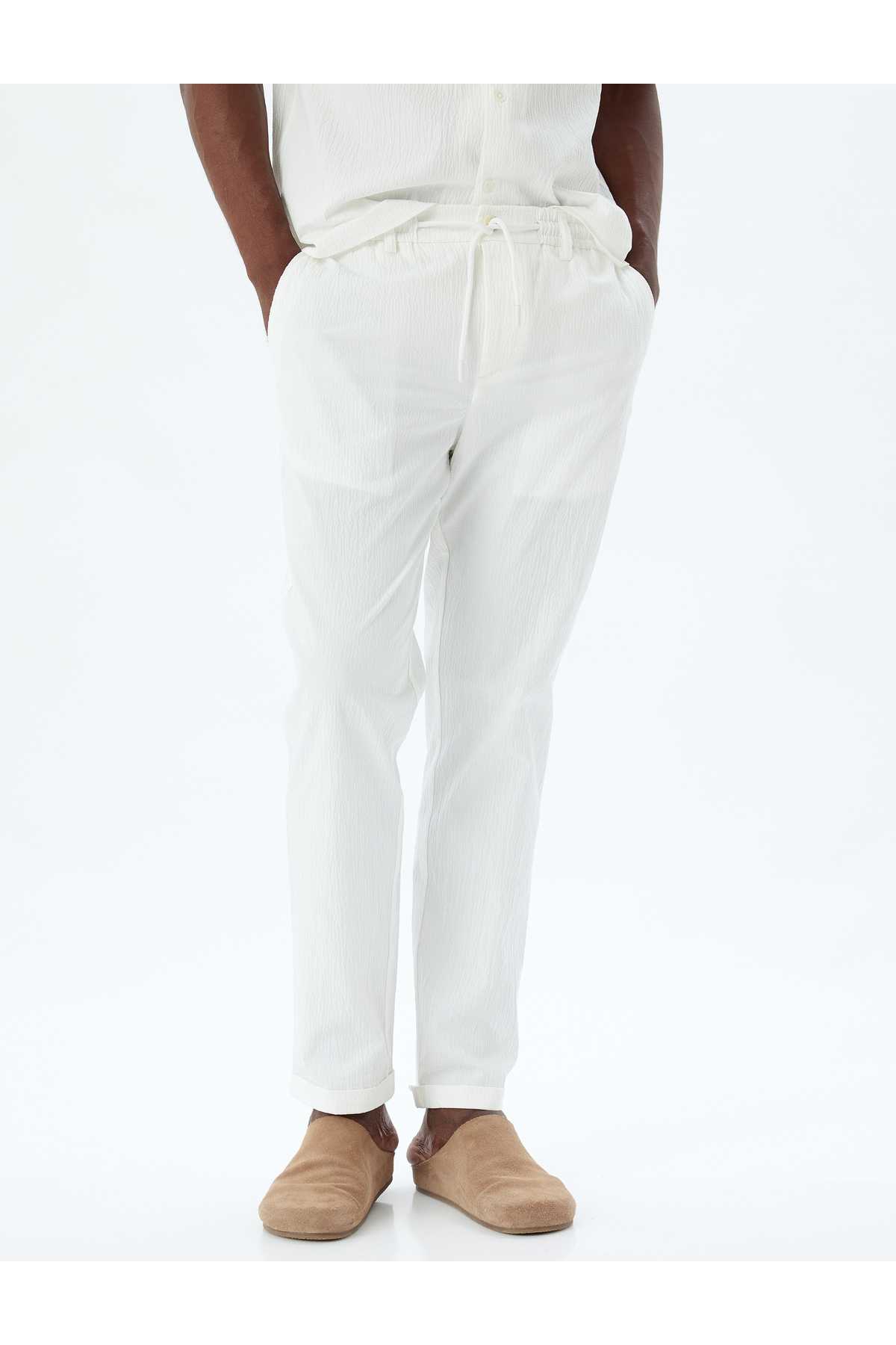 شلوار چینی با جزییات جیبی و دور کمر توری