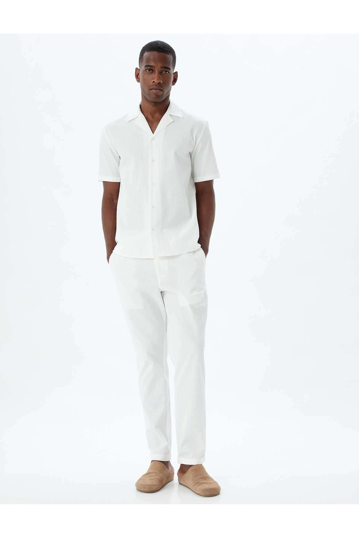 شلوار چینی با جزییات جیبی و دور کمر توری