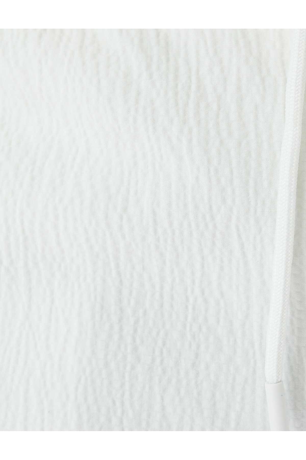 شلوار چینی با جزییات جیبی و دور کمر توری