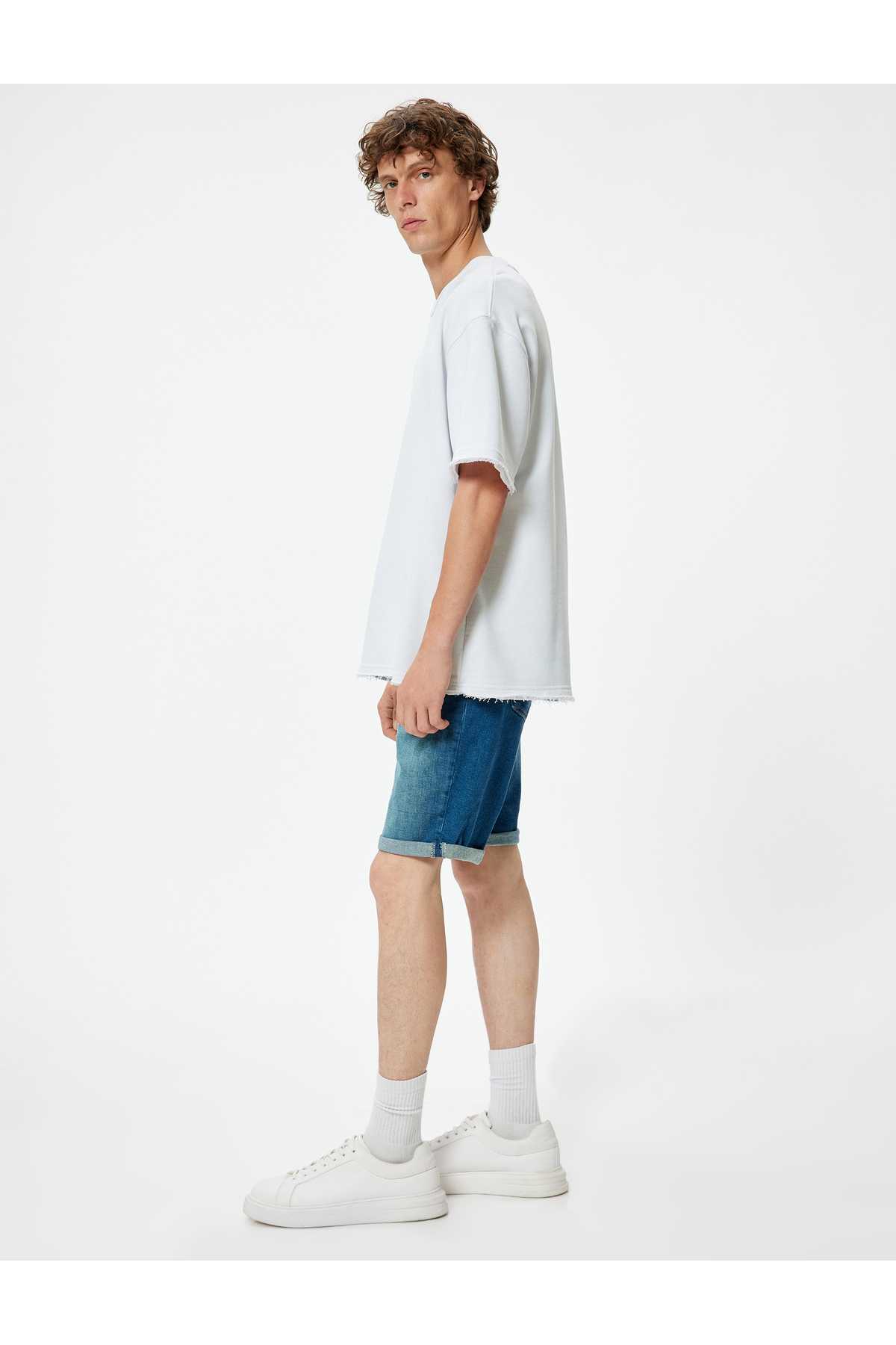 شلوارک جین باریک با جیب تاشو برمودا با جزئیات نخی