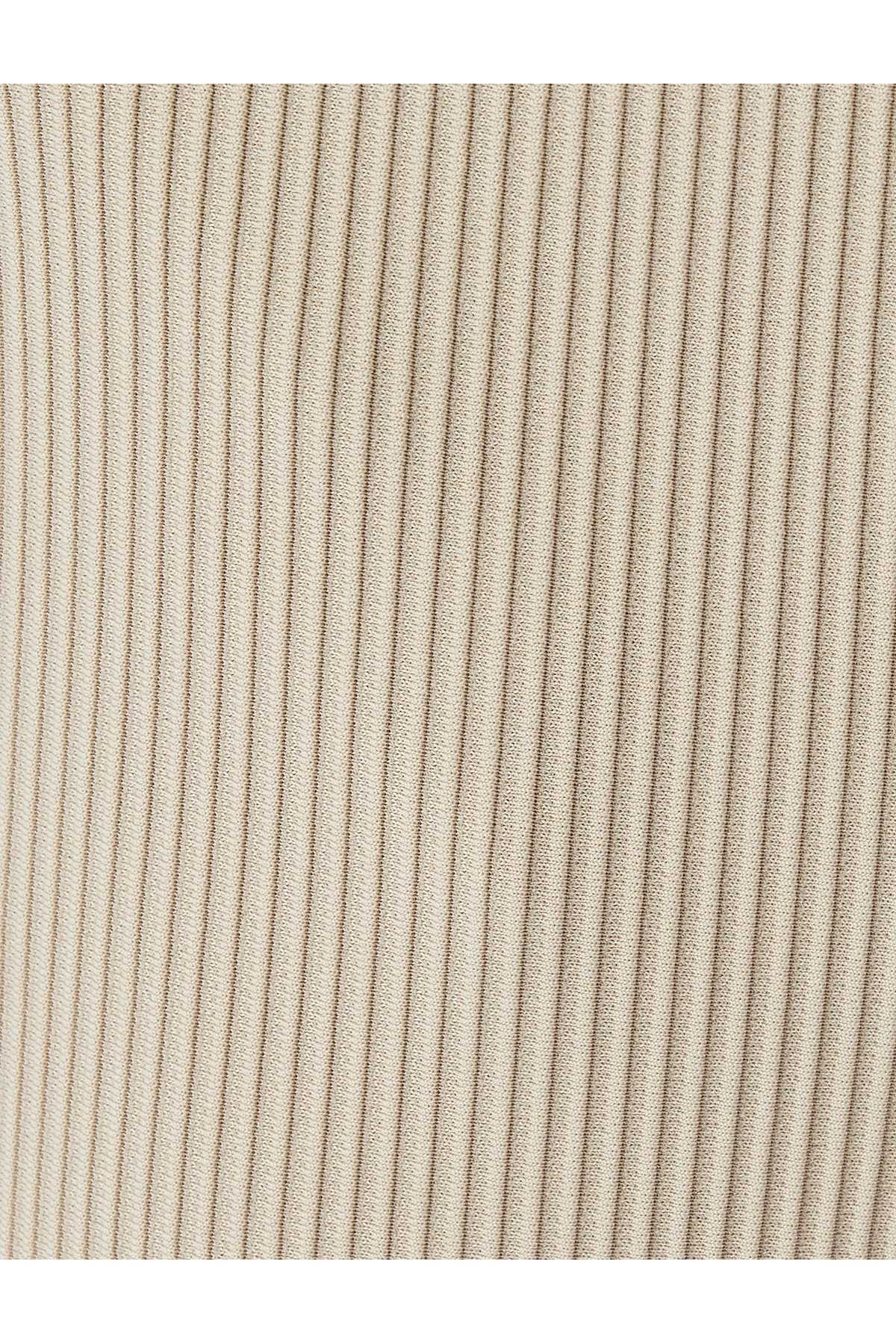 شلوار دندهدار جیبی با جزئیات با کمربند