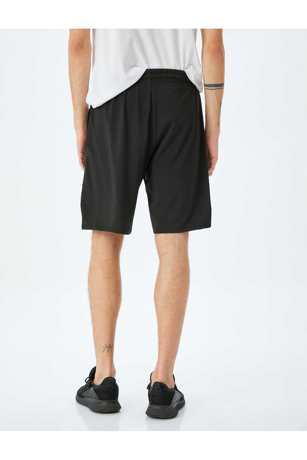 شلوارک اسپرت چاپ شده با جیب کمری توری