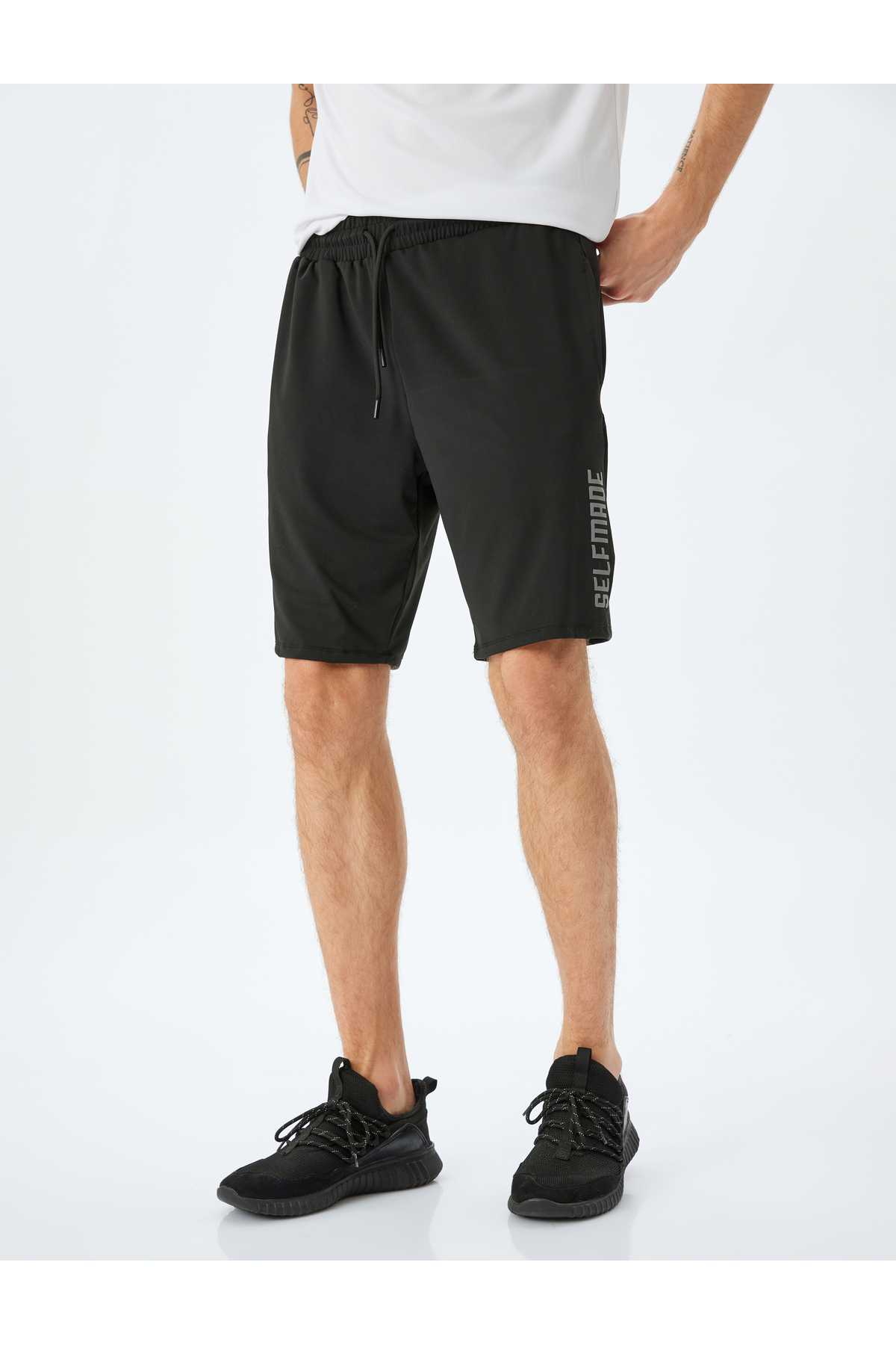 شلوارک اسپرت چاپ شده با جیب کمری توری