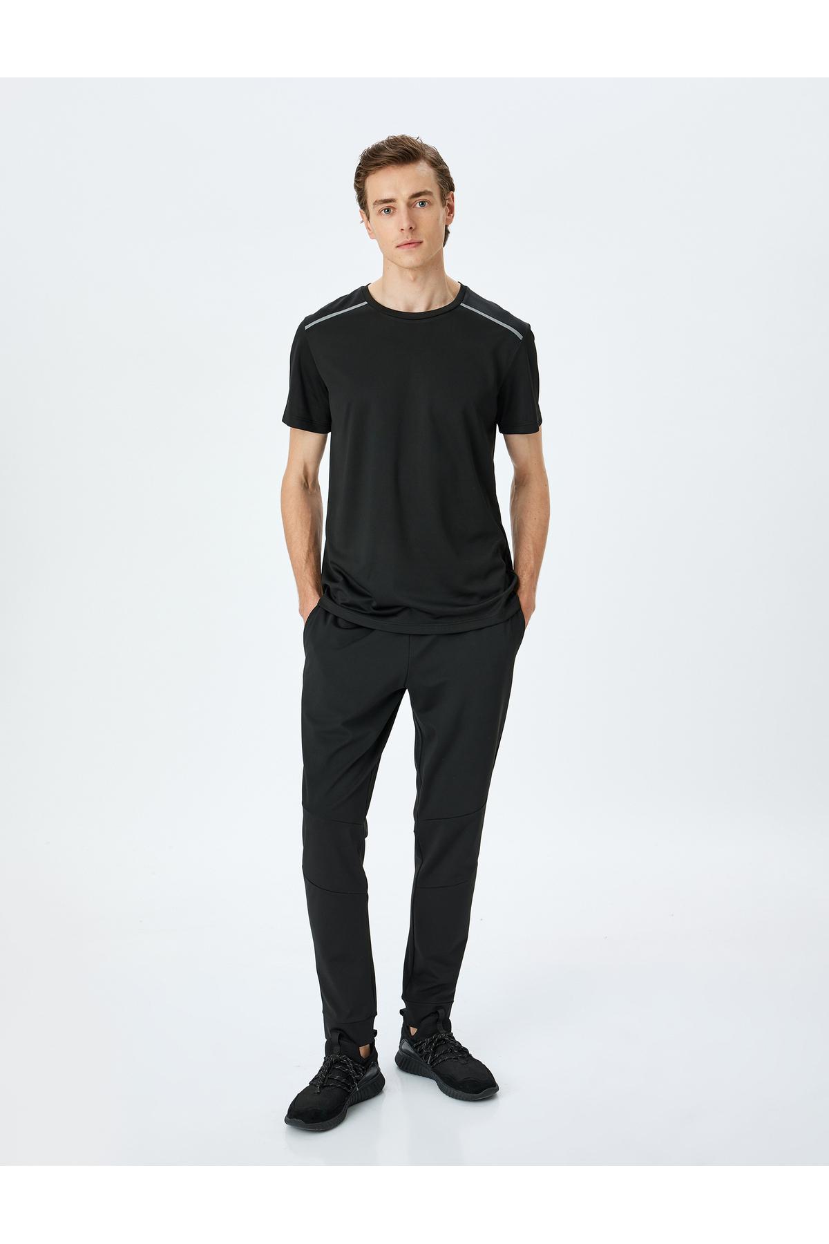 شلوار ورزشی Jogger با جزئیات دوخت و دور کمر توری